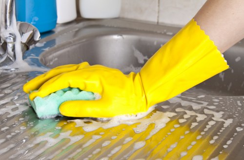Carpet cleaner treating a stain in a central London property